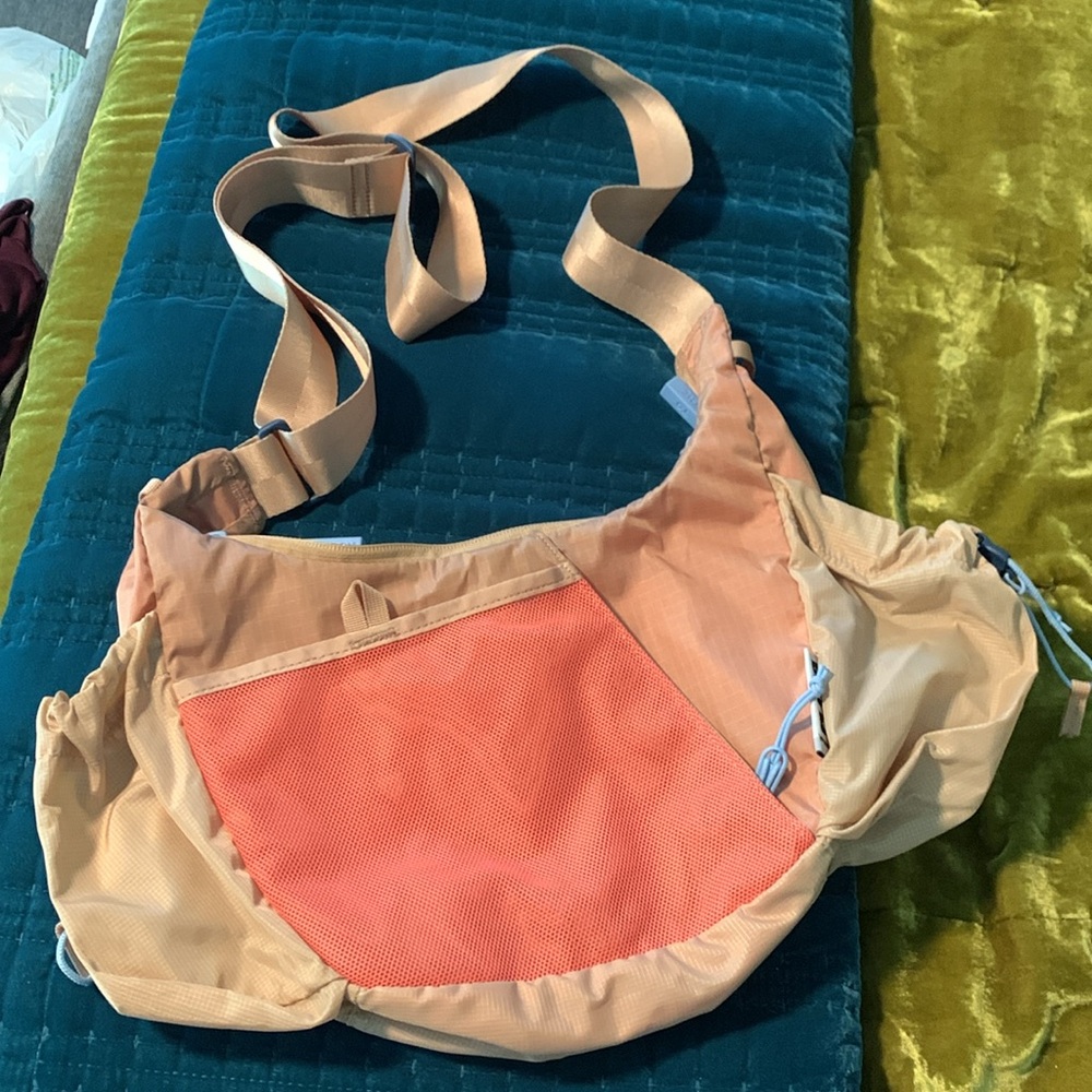 baboon to the moon crescent cross body bag